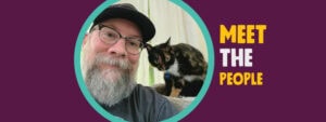 Eggplant background with a circular center photo of a person with a beard and glasses next to a cat. Text on the right reads, "Meet the People"