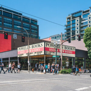 The exterior of Powell's Books on a sunny day in Portland, Oregon.